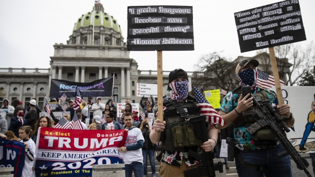 Protesters demonstrate the State Capitol in Harrisburg, Pa., on Monday, April 20, 2020