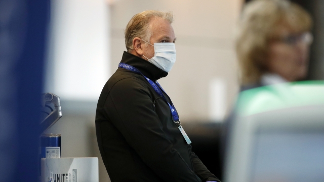 United Airlines employee wearing mask