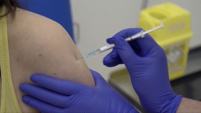 Screen grab taken from video issued by Britain's Oxford University, showing a person being injected