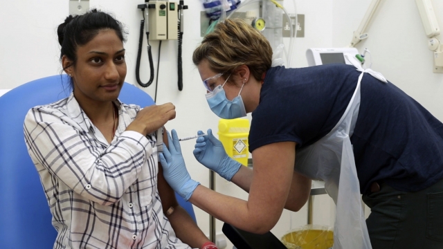 Volunteer receives trial vaccine