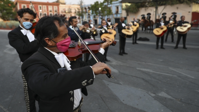 Mask Wearing Mariachis in Mexico City.
