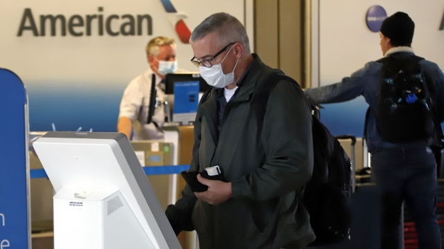 Man uses American Airlines kiosk