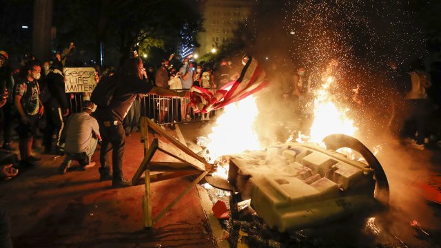 Protesters set a fire in Washington D.C.