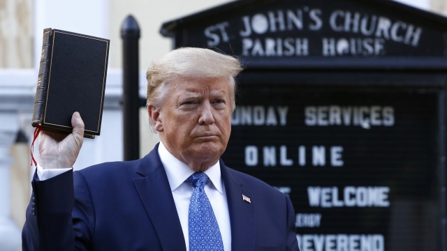 President Trump holds a Bible at St. John's Episcopal Church