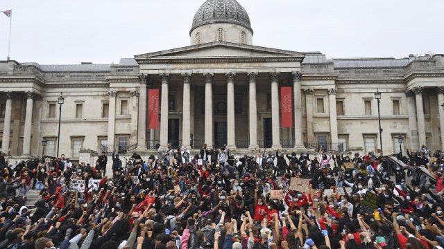 Protesters gather in London's Trafalgar Square on Wednesday, June 3, 2020, during a demonstration over the death of George Fl
