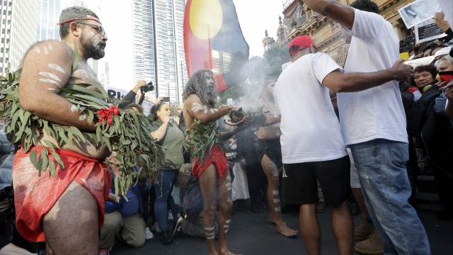 Aboriginal Australian perform smoke ceremony during local George Floyd protest