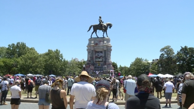 Thousands protest in front of the Gen. Robert E. Lee statue in Richmond, Virginia