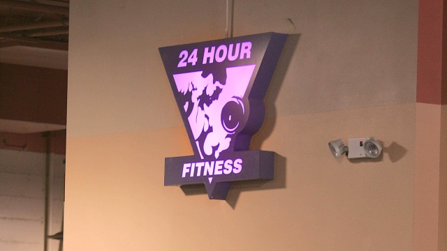 24 Hour Fitness logo at a gym.