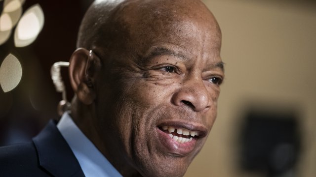 Rep. John Lewis, D-Ga., speaks during a television interview at the Capitol in Washington.