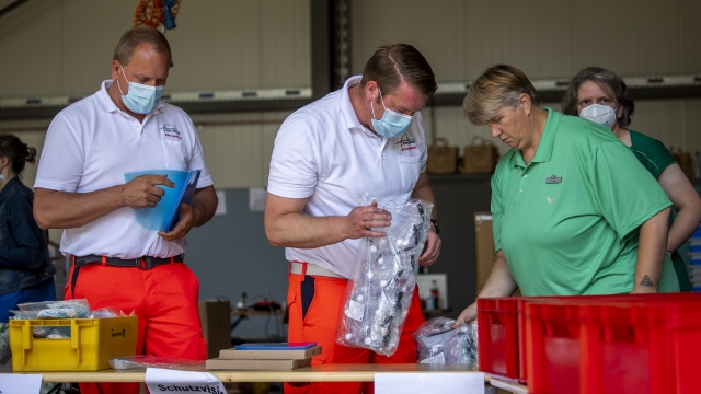 Mobile teams testing people on the coronavirus collect their equipment at a fire station in Rheda-Wiedenbrueck, Germany