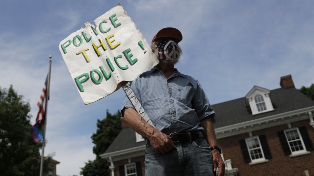 A protester in front of the St. Paul, MN governor's mansion on Saturday, June 6, 2020.