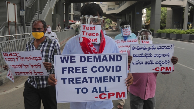 Communist Party activists in Hyderabad, India, calling for COVID-19 testing and free treatment