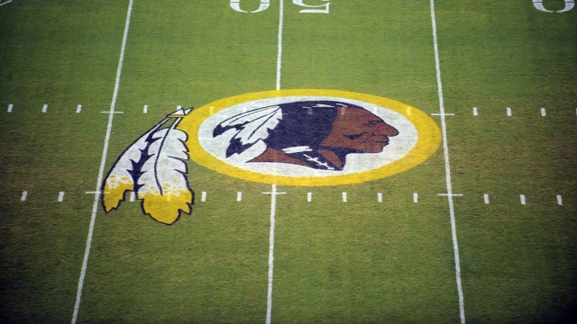The Washington Redskins logo is shown on the field.