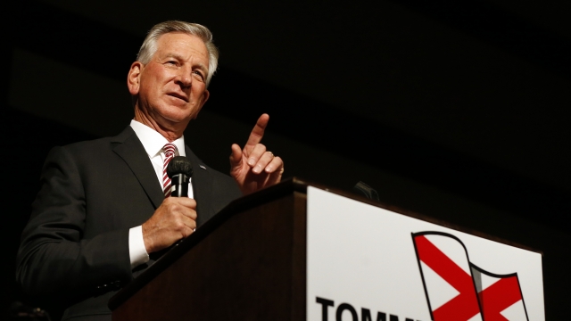 Former Auburn football coach Tommy Tuberville speaks to supporters
