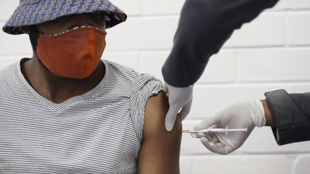 A test volunteer receives a vaccine candidate