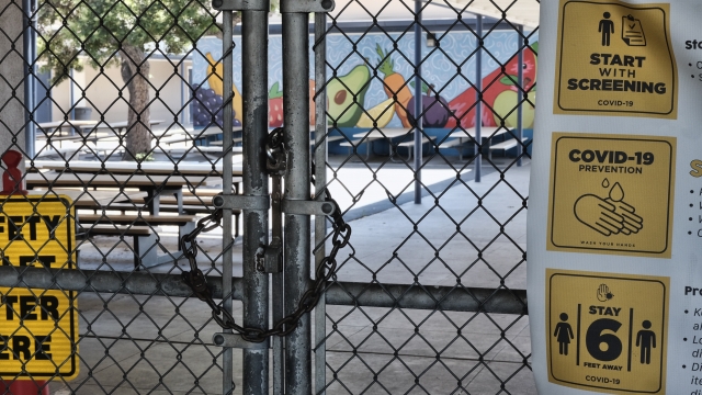 A chain link fence lock is see on a gate at a closed Ranchito Elementary School in the San Feranando Valley section of LA