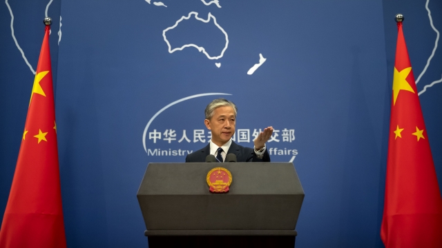 China's Ministry of Foreign Affairs spokesperson Wang Wenbin gestures during a daily briefing