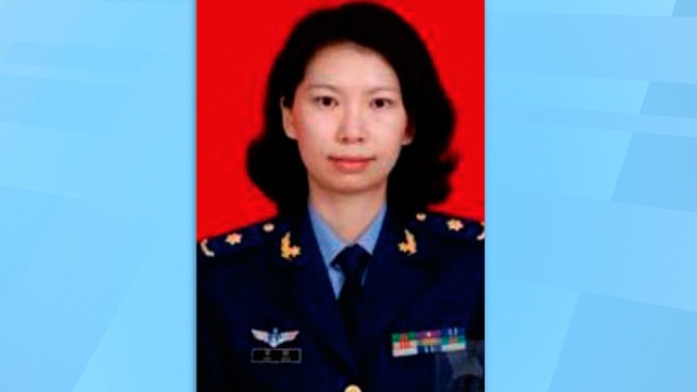 This undated photo provided by the U.S. Justice Department shows Juan Tang in her China People's Liberation Army uniform