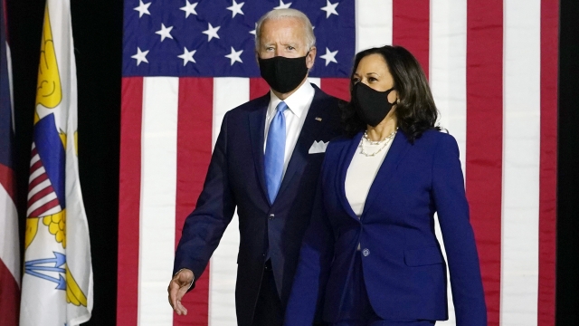 Joe Biden and Kamala Harris arrive to speak at their first joint campaign event in Wilmington, Delaware.