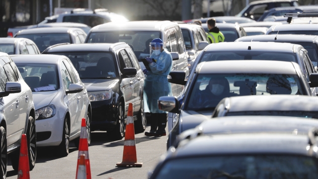 Cars queue at a COVID-19 test centre in Auckland, New Zealand, Thursday, Aug. 13, 2020