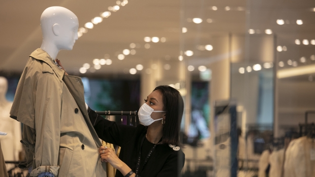 Department store employee fixes mannequin in Japan