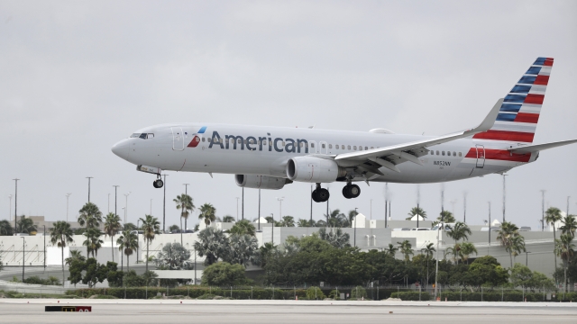 An American Airlines flight lands at an airport