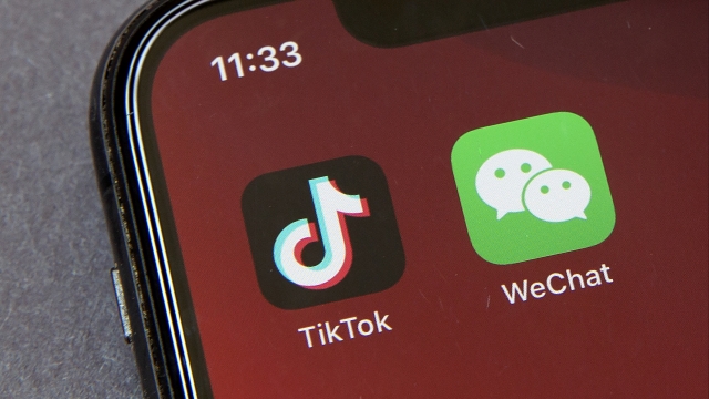 TikTok and WeChat sit side by side on an iPhone home screen