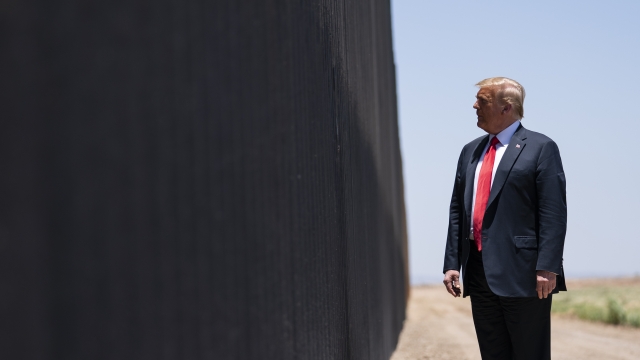 President Donald Trump tours a section of the border wall, Tuesday, June 23, 2020, in San Luis, Ariz.