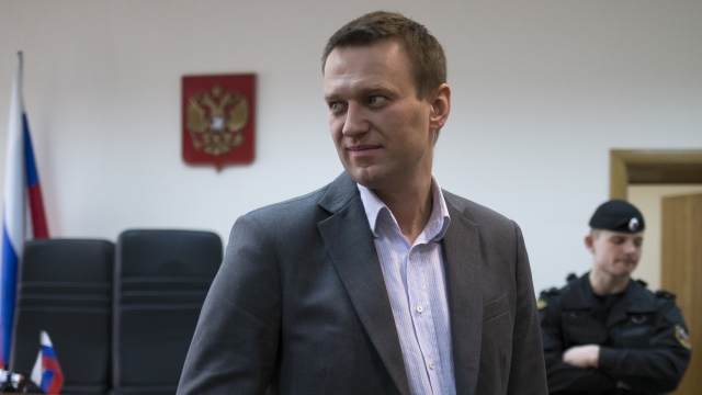 Russian opposition activist Alexey Navalny talks to journalists.