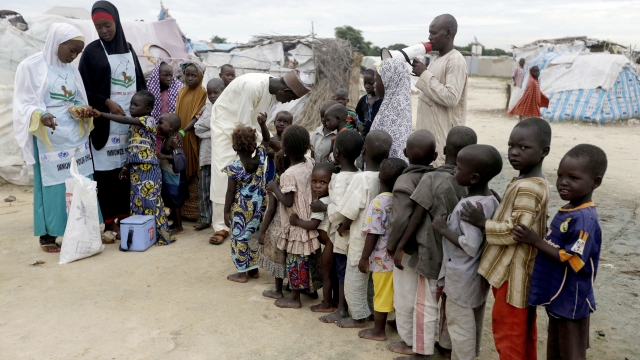 Health officials provide polio vaccines to children in Nigeria in 2016.