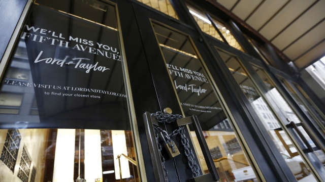 A padlock secures a set of doors on a side entrance to Lord & Taylor's flagship Fifth Avenue store.