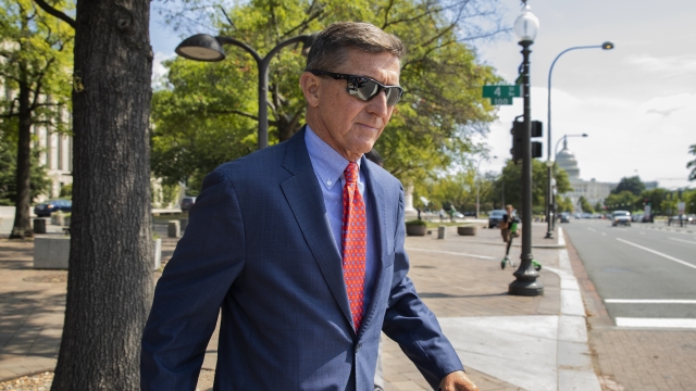 Michael Flynn, President Donald Trump's former national security adviser, leaves the federal court.