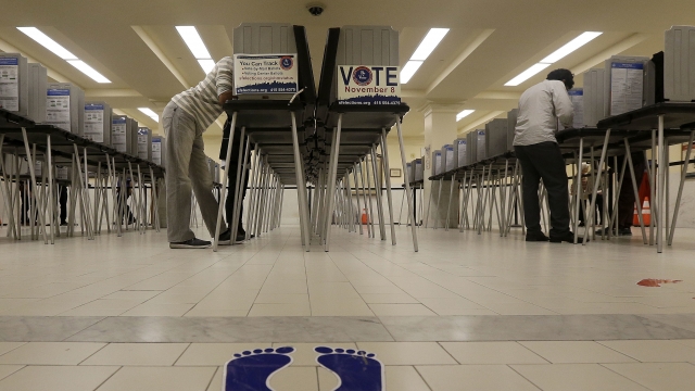Voters cast ballots at City Hall in San Francisco.