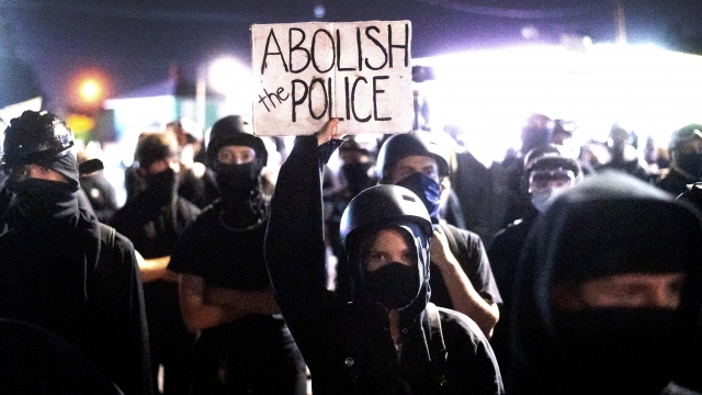 Anti-police protesters rally outside the Portland Police Association building on Friday, Sept. 4, 2020, in Portland, OR