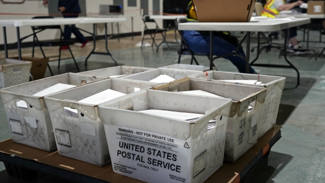 Workers prepare absentee ballots in North Carolina