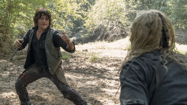 This image released by AMC shows Norman Reedus, left, and Samantha Morton in a scene from "The Walking Dead."