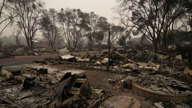 Rubble remains from an area destroyed by the Almeda Fire, Friday, Sept. 11, 2020, in Talent, Ore.