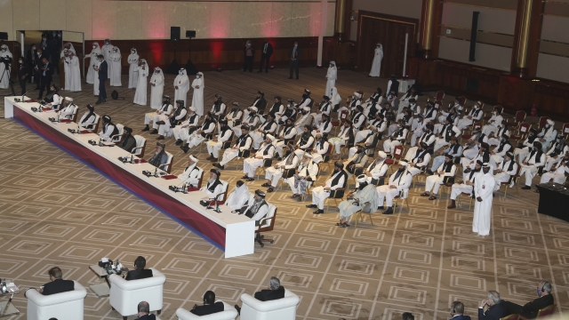 Taliban delegation attend the opening session of the peace talks between the Afghan government and the Taliban in Doha, Qatar