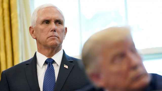 Mike Pence with Donald Trump in the foreground