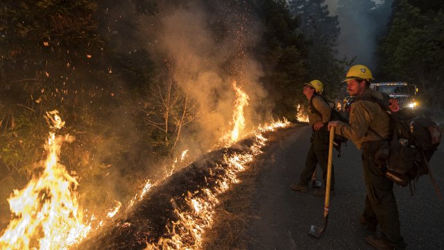 Firefighters work to control a blaze near Big Sur, California.