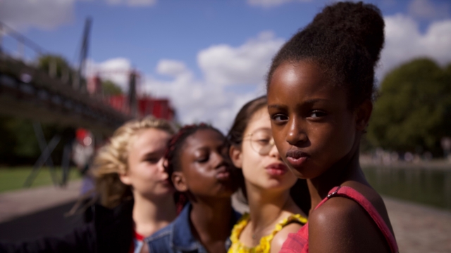 This image released by Netflix shows the cast of the coming-of-age film "Cuties."