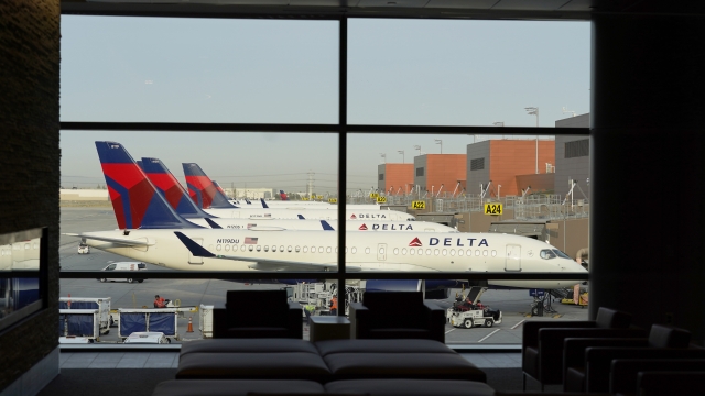 Delta flights are shown at their gates at the Salt Lake City International Airport.