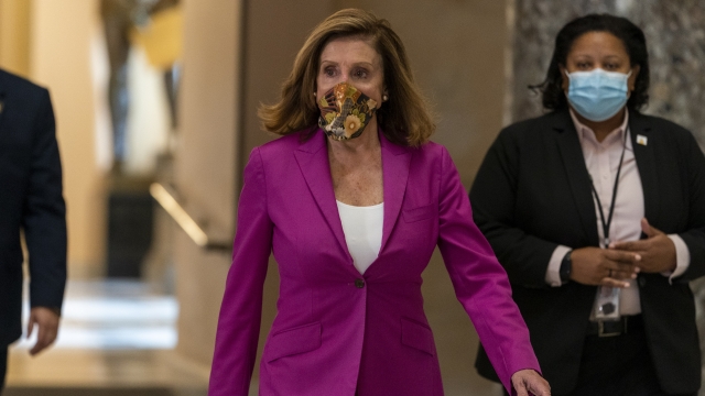 House Speaker Nancy Pelosi of Calif. walks to her office on Capitol Hill.