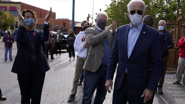 Democratic presidential candidate former Vice President Joe Biden leaves the Amazing Grace Bakery & Cafe in Duluth, Minn.
