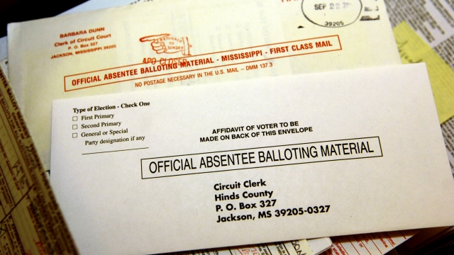 A small box of absentee ballots from men and women serving in the Armed Forces sits in the Hinds County Circuit Court office