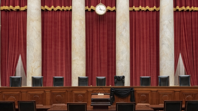 Bench draped for the death of Supreme Court Associate Justice Ruth Bader Ginsburg at the Supreme Court