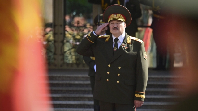 Belarusian President Alexander Lukashenko salutes during his inauguration ceremony