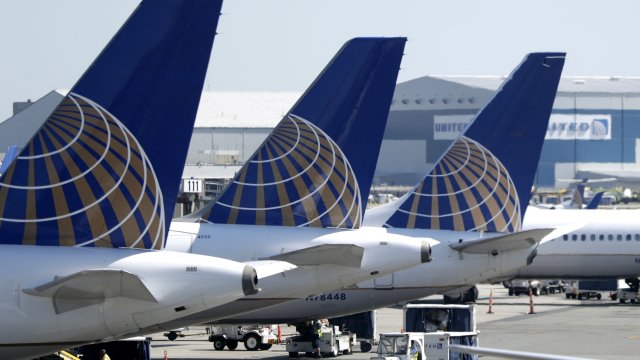 United Airlines commercial jets sit at a gate at Terminal C of Newark Liberty International Airport