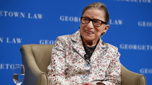 Supreme Court Justice Ruth Bader Ginsburg smiles at an event in 2018