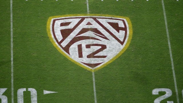 Pac-12 logo on a football field